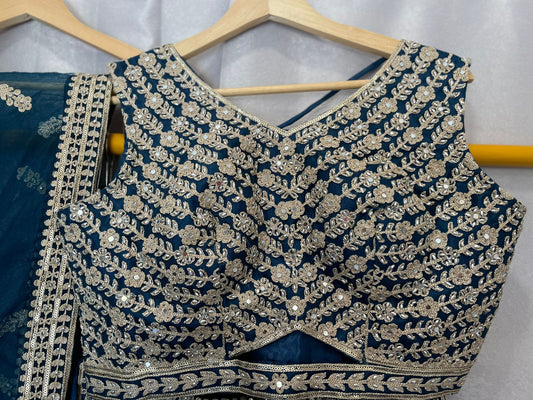 Aari work and zarkan designer blue lehenga with stylish choli