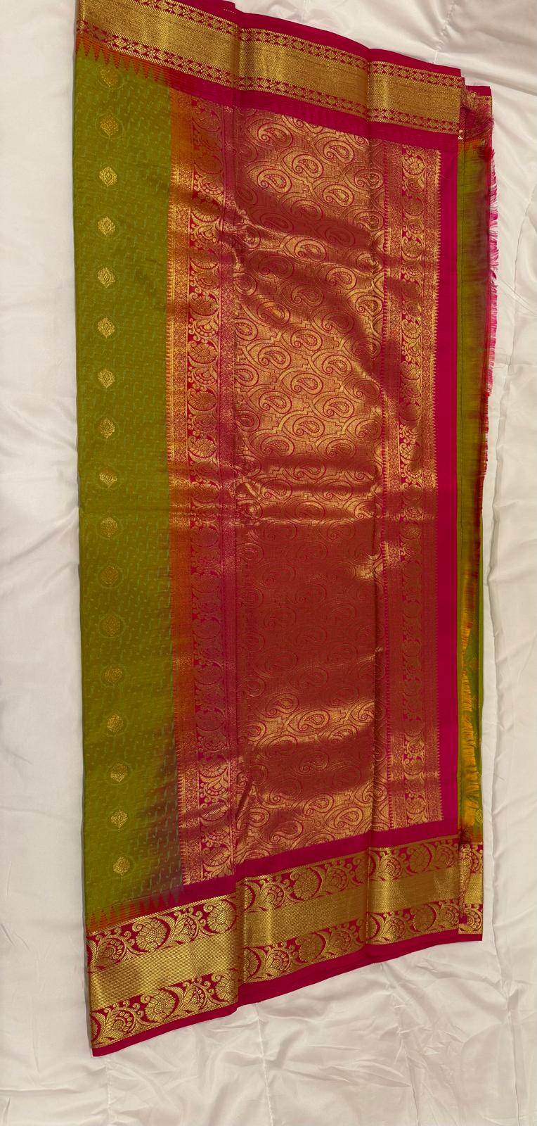 Parrot green pink semi kanchivaram silk saree with attached blouse piece
