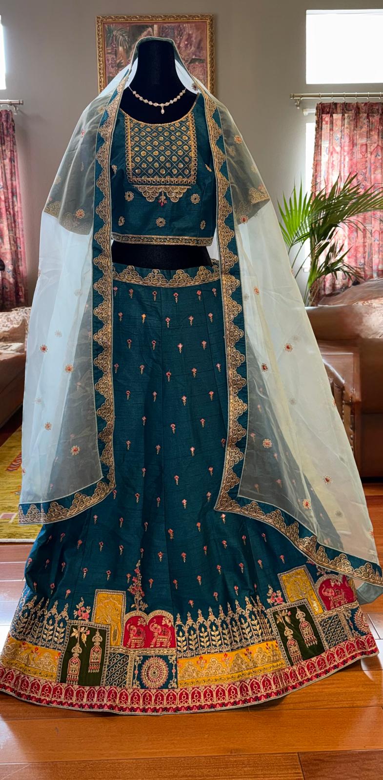 Blue silk embroidery mirror work lehenga with designer choli