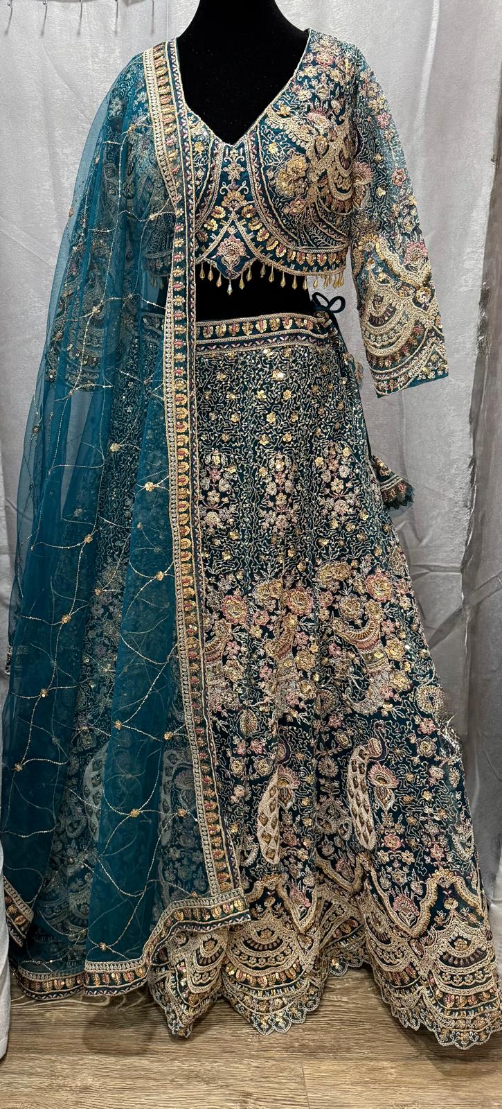 teal blue peacock embroidery sequence heavy lehenga with designer blouse