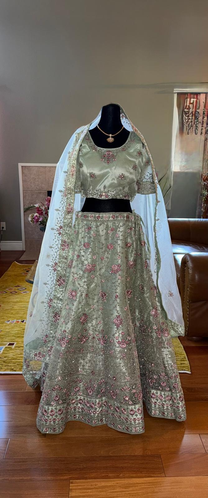 Mint green net embroidery pink flower zarkan diamond heavy lehenga