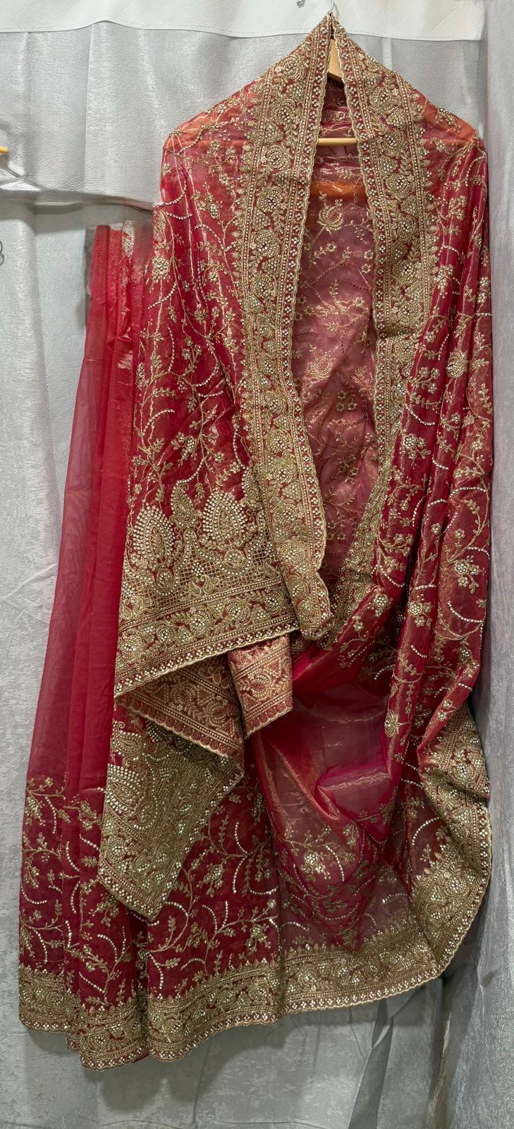 pink heavy gold zarkan embroidery tissue net saree with attached blouse and matching petticoat