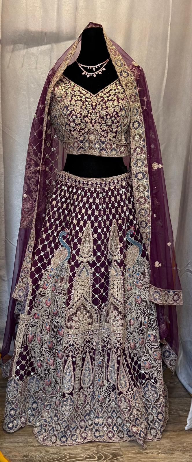 Purple brown net lehenga with pearl gold zarkan peacock embroidery with designer blouse