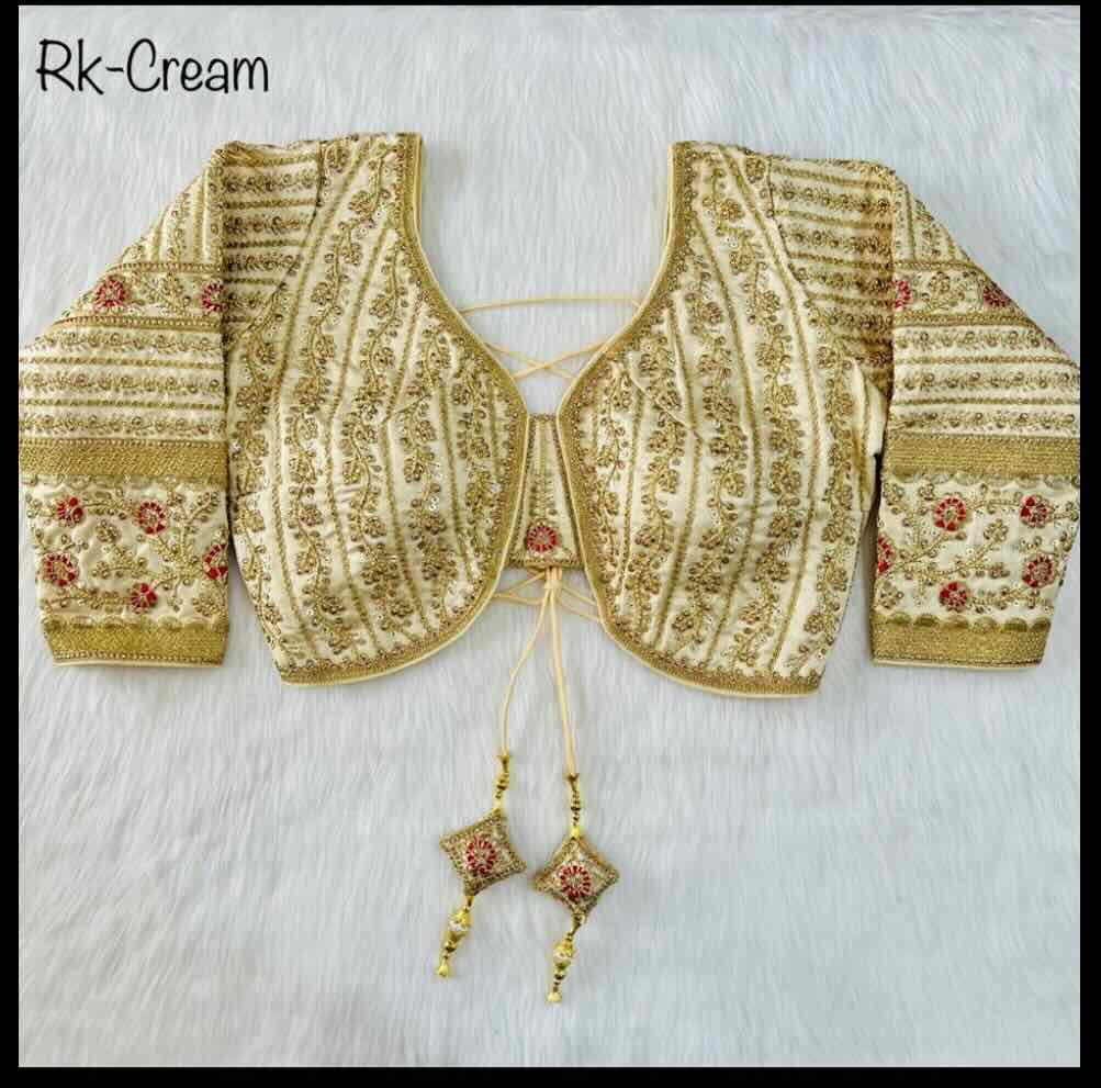 cream full sleeve blouse with heavy gold embroidery work