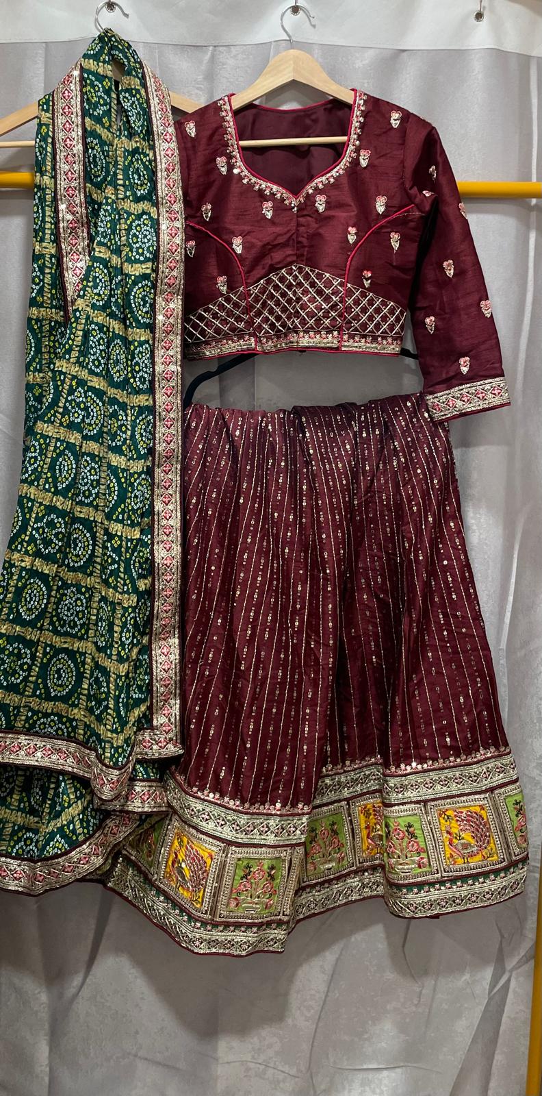 Wine brown silk sequence peacock motif lehenga with green bandani dupatta