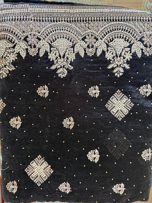 black fendi silk saree with embroidery and heavy stone work with attached designer blouse piece