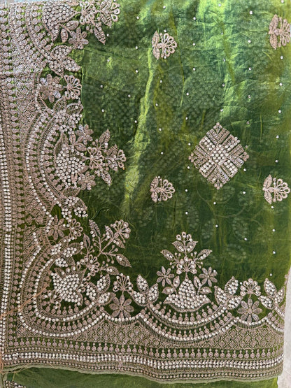 parrot green fendi silk saree with embroidery and heavy stone work with attached designer blouse piece