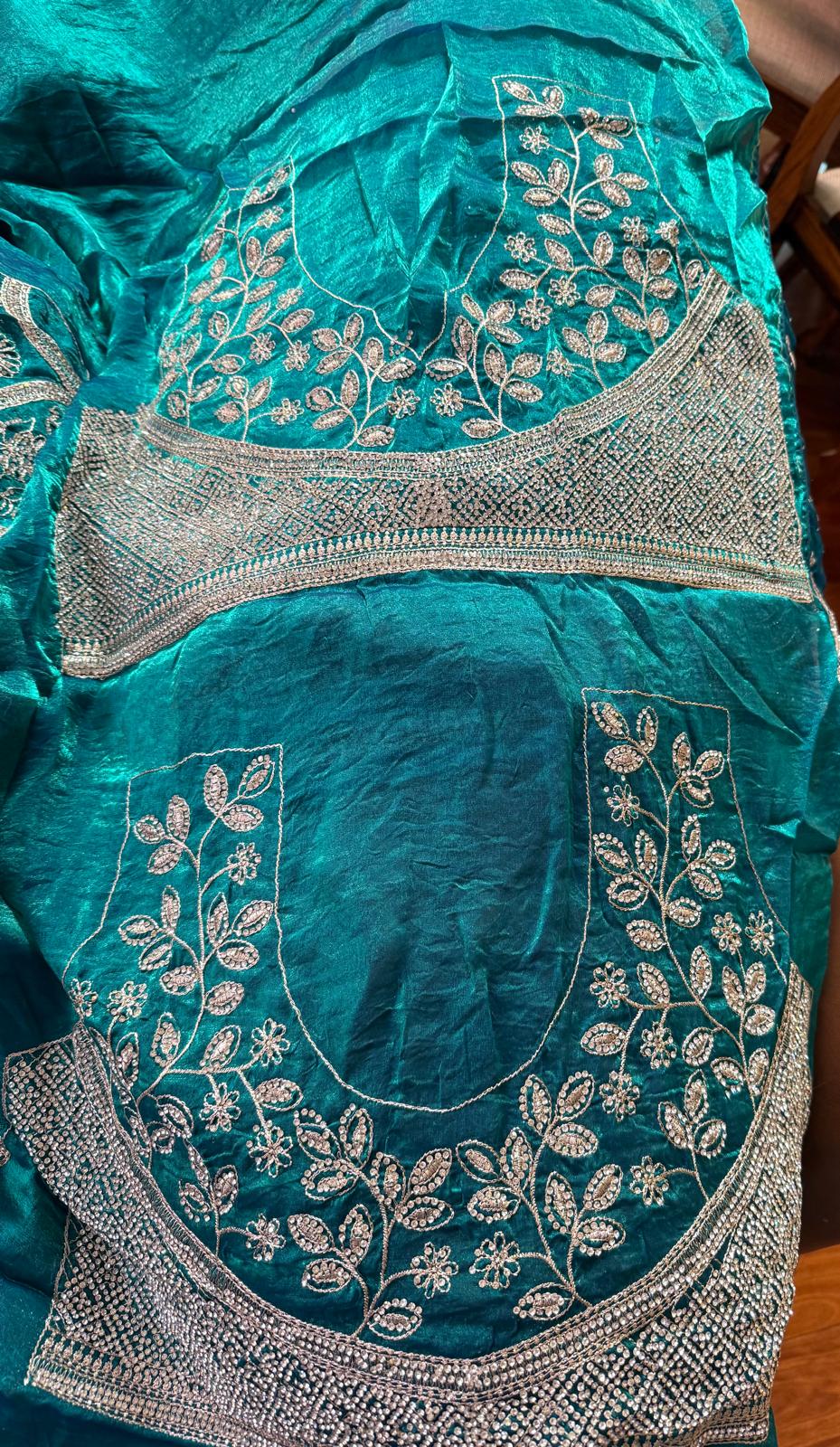 teal blue  fendi silk saree with embroidery and heavy stone work with attached designer blouse piece