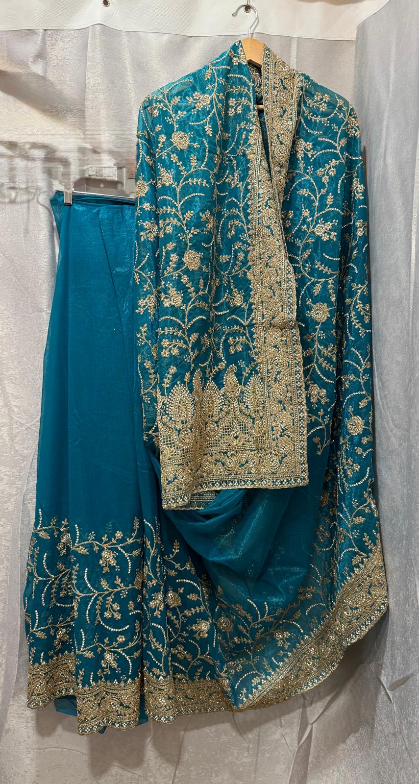 blue heavy gold zarkan embroidery tissue net saree with attached blouse and matching petticoat