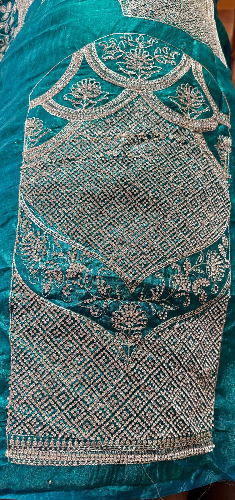 teal blue  fendi silk saree with embroidery and heavy stone work with attached designer blouse piece