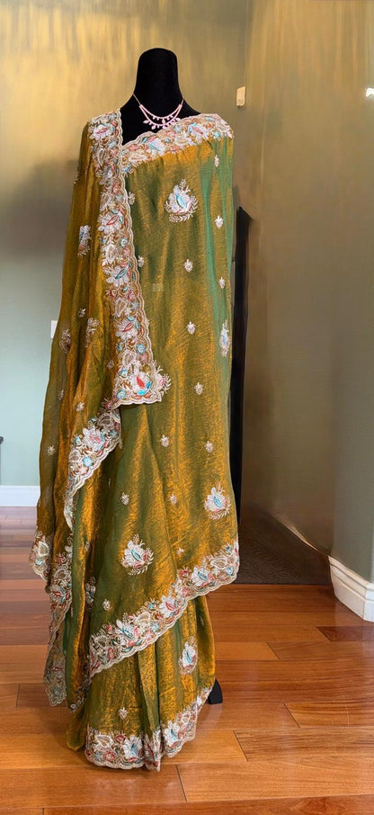 Green fendi silk saree with embroidery and stone work with attached blouse piece