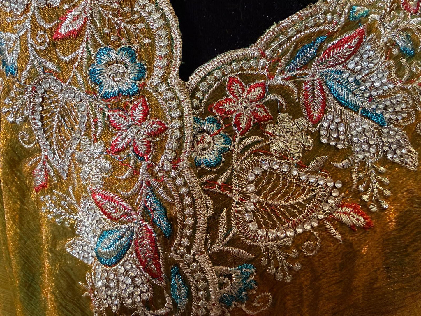 Green fendi silk saree with embroidery and stone work with attached blouse piece