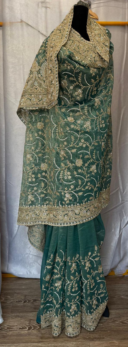 green heavy gold zarkan embroidery tissue net saree with attached blouse and matching petticoat
