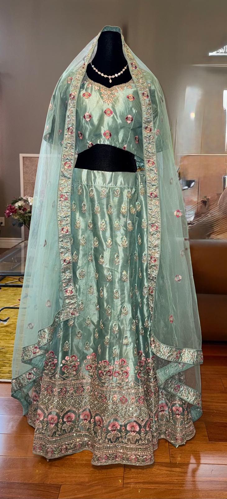 Green mint net zarkan heavy flower embroidery lehenga