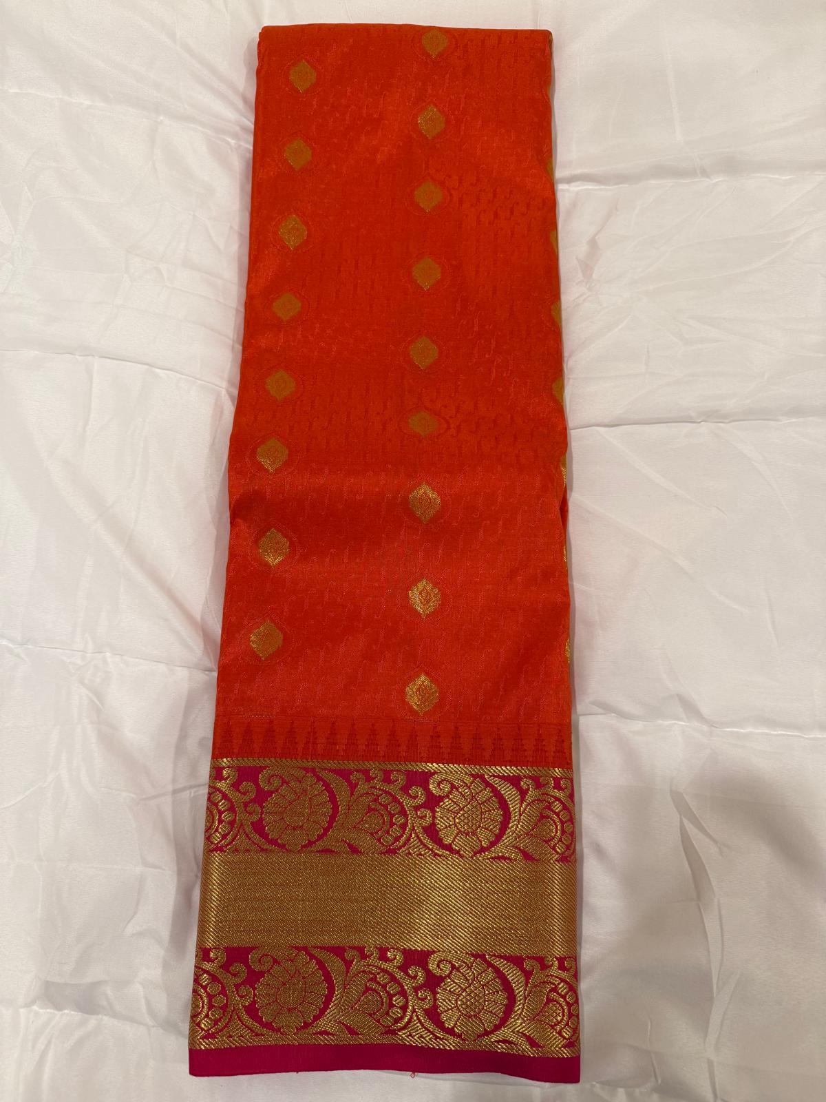 Orange pink semi kanchivaram silk saree with attached blouse piece