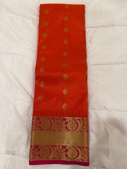 Orange pink semi kanchivaram silk saree with attached blouse piece