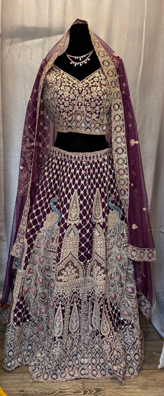 Purple brown net lehenga with pearl gold zarkan peacock embroidery with designer blouse