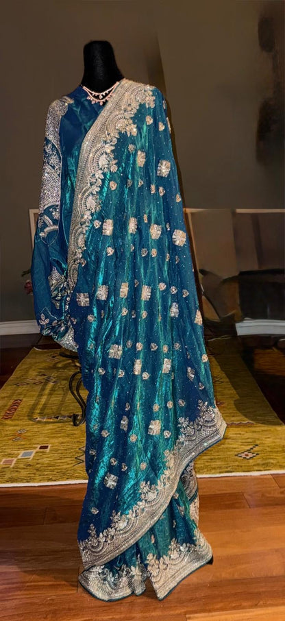 black fendi silk saree with embroidery and heavy stone work with attached designer blouse piece