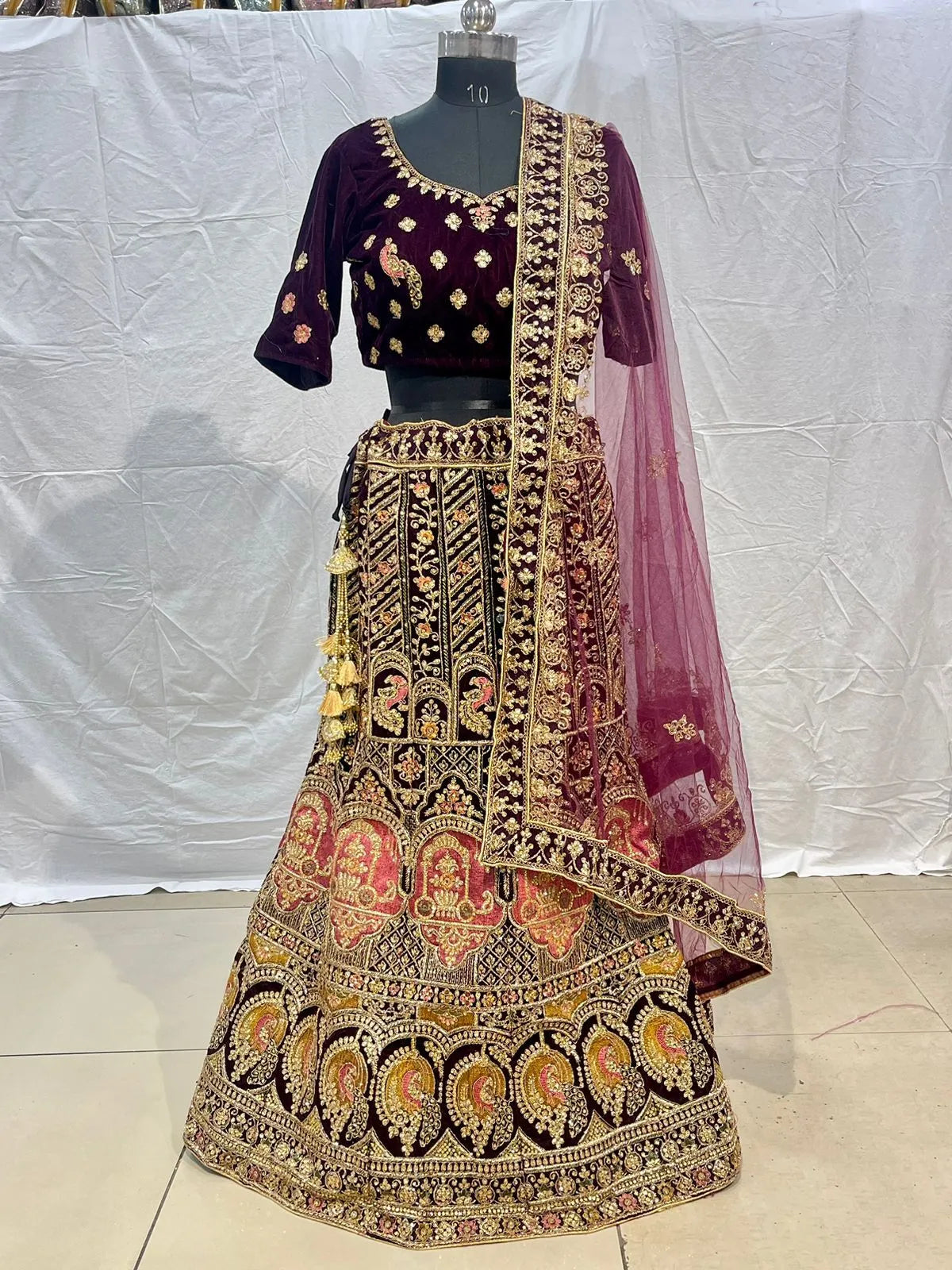 Wine purple velvet embriodery zarkan heavy lehenga