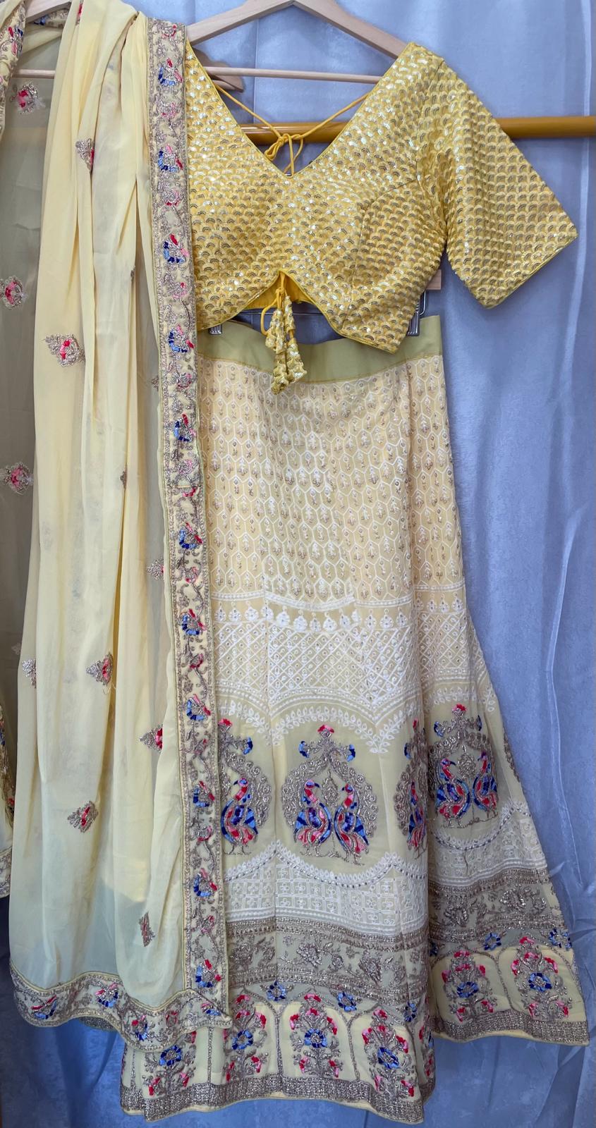 Yellow georgette lakhnavi zarkan peacock embroidery lehenga with designer choli