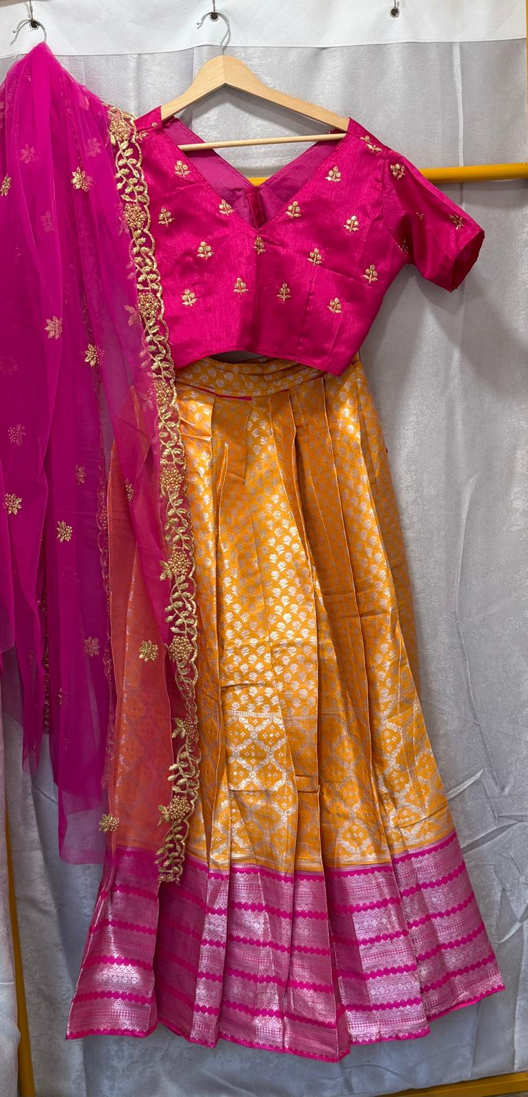 Pink yellow half saree lehenga