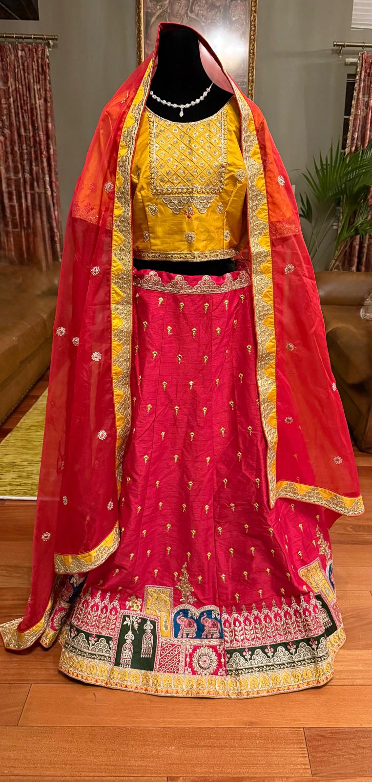 Pink yellow silk embroidery mirror work lehenga with designer choli